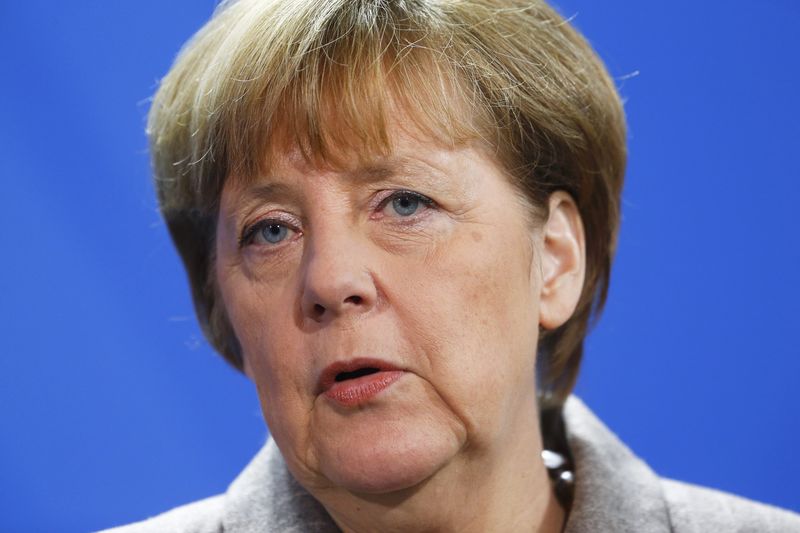 © Reuters. German Chancellor Merkel speaks to media after her meeting with Turkish Prime Minister Davutoglu at the Chancellery in Berlin