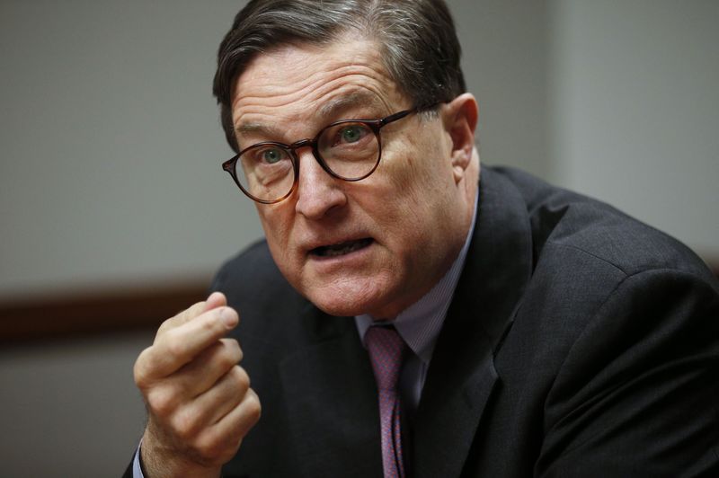 © Reuters. Richmond Federal Reserve Bank President Lacker reacts during an interview with Reuters reporters in Washington
