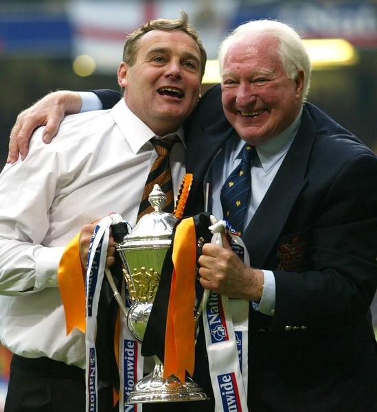 © Reuters. WOLVERHAMPTON WANDERERS' HAYWARD AND JONES HOLD THE CUP AFTER THEIR
TEAMS VICTORY OVER SHEFFIELD UNITED ...