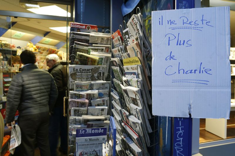 © Reuters. RAZZIA SUR CHARLIE HEBDO