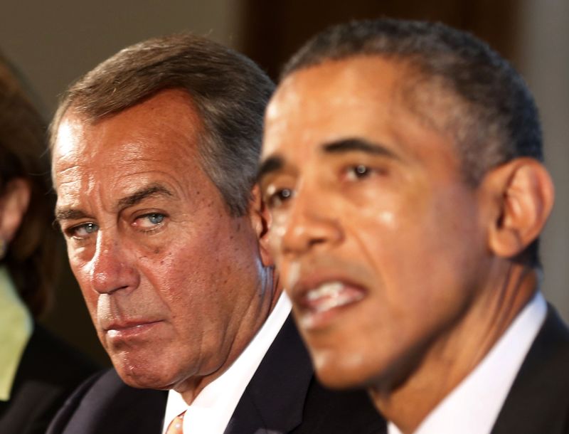 © Reuters. U.S. Speaker of the House John Boehner listens as U.S. President Barack Obama hosts a bipartisan meeting of Congressional leaders in the Cabinet Room of the White House in Washington