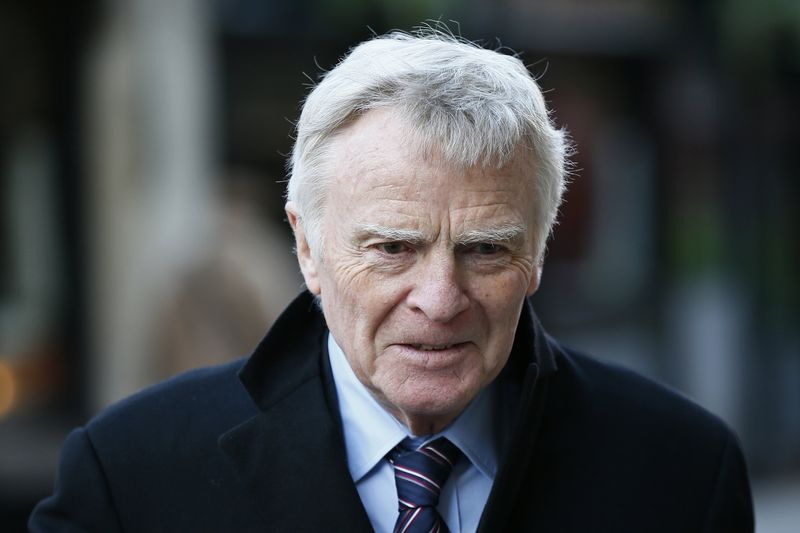 © Reuters. Former FIA racing chief Max Mosley leaves the High Court in London