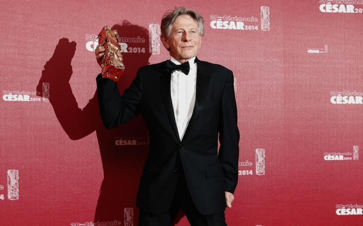 © Reuters. Roman Polanski poses with Best Director award for "La Venus A La Fourrure" at the 39th Cesar Awards ceremony in Paris