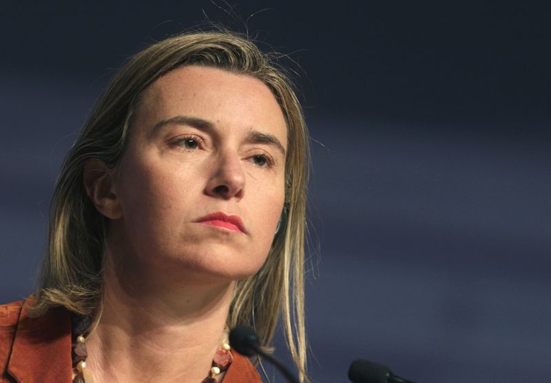 © Reuters. European Commission High Representative Mogherini listens during a news conference in Riga