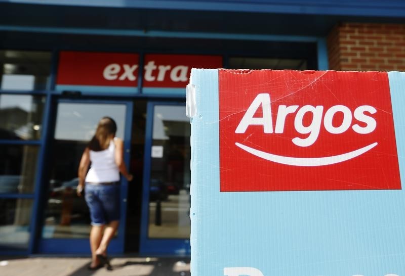 © Reuters. A customer enters an Argos Extra store in Ashford