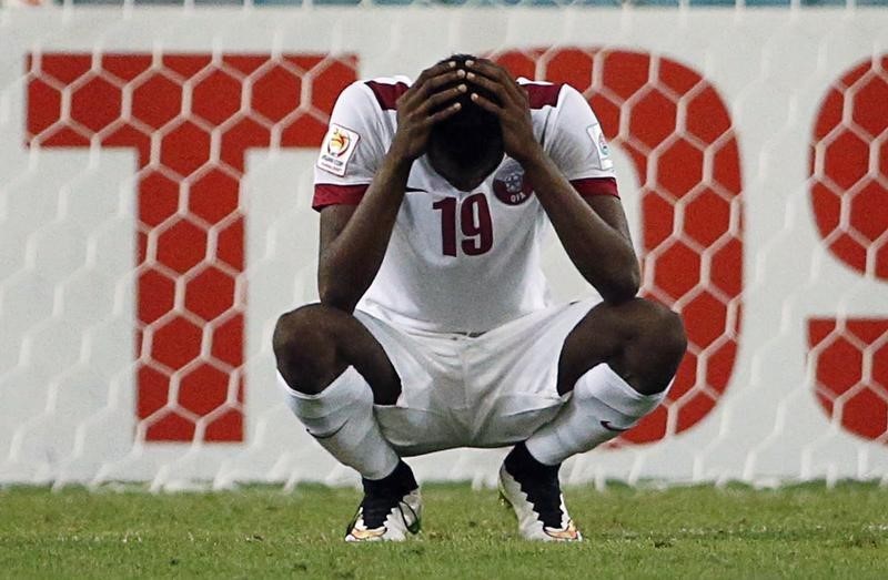 © Reuters. Qatar's Mohammed Muntari reacts after missing a goal scoring opportunity during their Asian Cup Group C soccer match against Iran at the Stadium Australia in Sydney