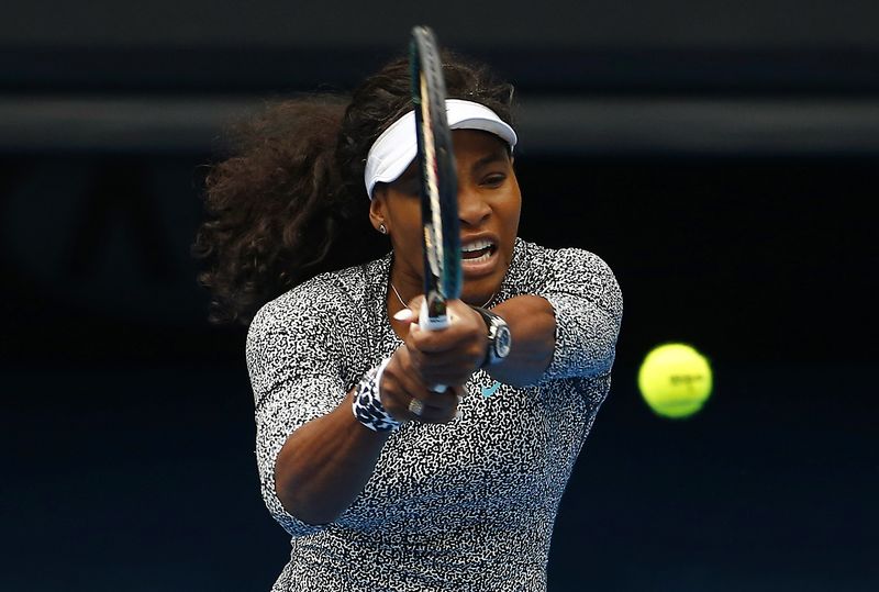 © Reuters. Serena Williams of the U.S. hits a shot during a practice session on Rod Laver Arena at Melbourne Park