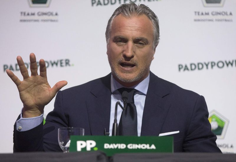 © Reuters. Former footballer David Ginola from France speaks at a press conference where he announced his campaign to stand for the FIFA presidency in London