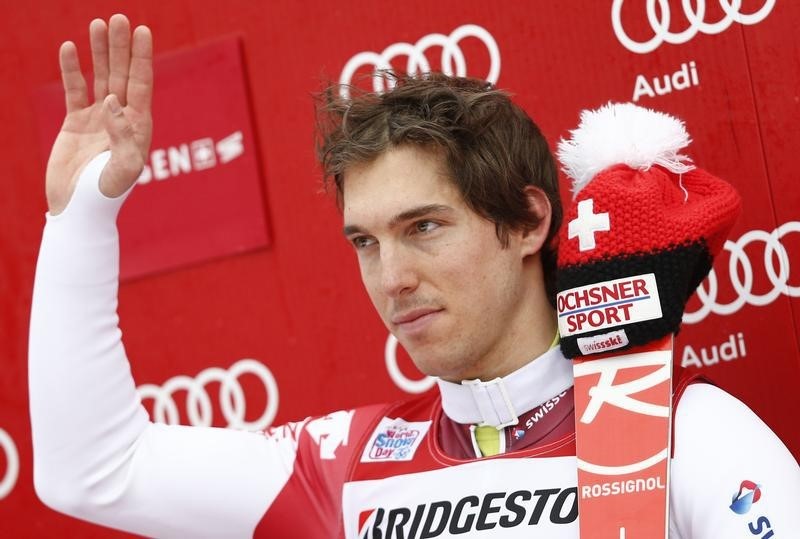 © Reuters. Janka of Switzerland reacts on the podium after winning men's Alpine Skiing World Cup Super Combined in Wengen