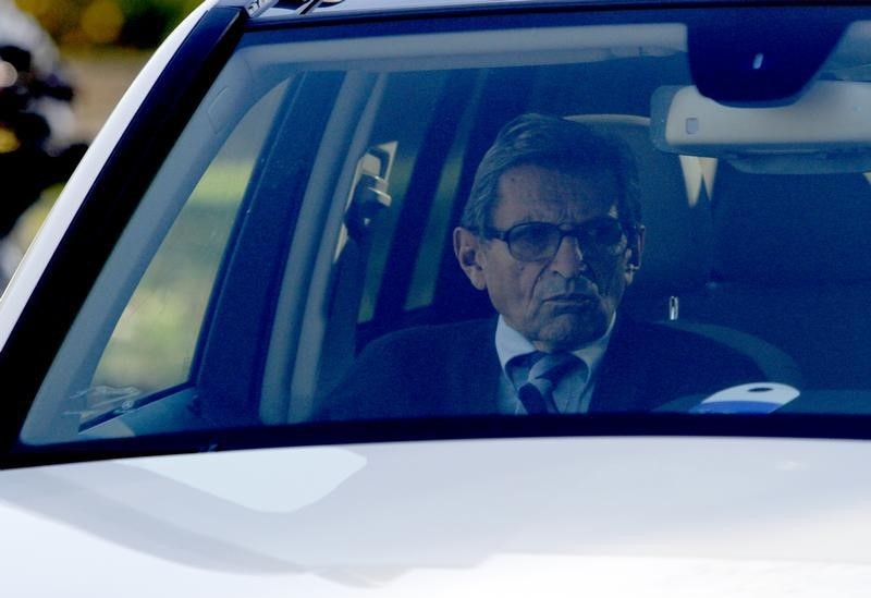 © Reuters. Penn State football coach Joe Paterno returns to his residence in State College