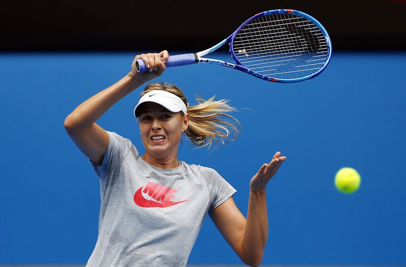 © Reuters. Russia's Maria Sharapova hits a shot during a practice session on Rod Laver Arena at Melbourne Park