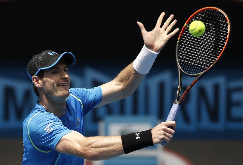 © Reuters. Britain's Andy Murray hits a shot during a practice session on Margaret Court Arena at Melbourne Park