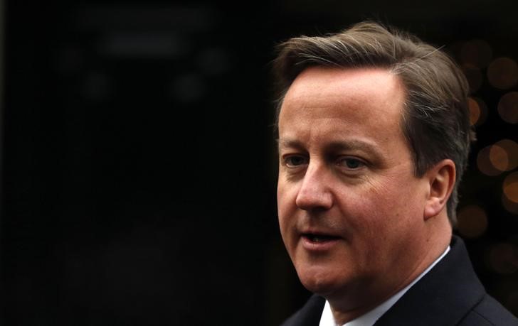 © Reuters. Britain's Prime Minister David Cameron arrives at Stormont House to take part in talks concerning disputes on flags, parades, the past and welfare reform, in Belfast