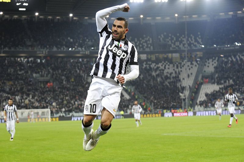 © Reuters. Juventus' Carlos Tevez celebrates after scoring against Hellas Verona during their Italian Serie A soccer match in Turin