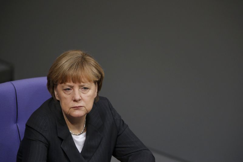 © Reuters. Merkel minimiza el impacto de las compras de bonos soberanos del BCE