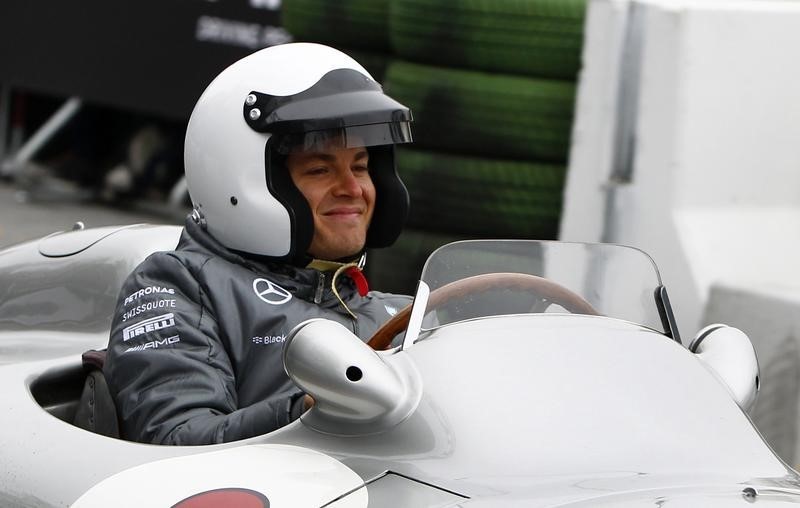 © Reuters. Mercedes Formula One driver Rosberg of Germany drives an old Formula One Car during annual 'Stars & Cars' event in Stuttgart