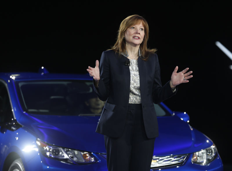 © Reuters. General Motors CEO Mary Barra speaks next to the 2016 Chevrolet Volt hybrid during the first press preview day of the North American International Auto Show in Detroit