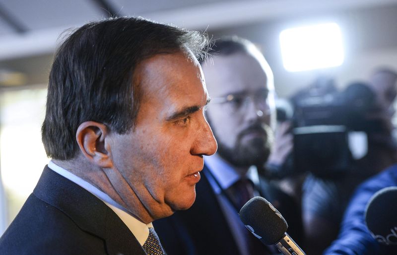 © Reuters. Prime Minister Stefan Lofven answers questions after a news conference at the Swedish Parliament in Stockholm