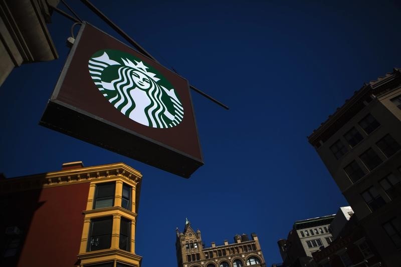 © Reuters. The sign of a Starbucks store is seen in New York