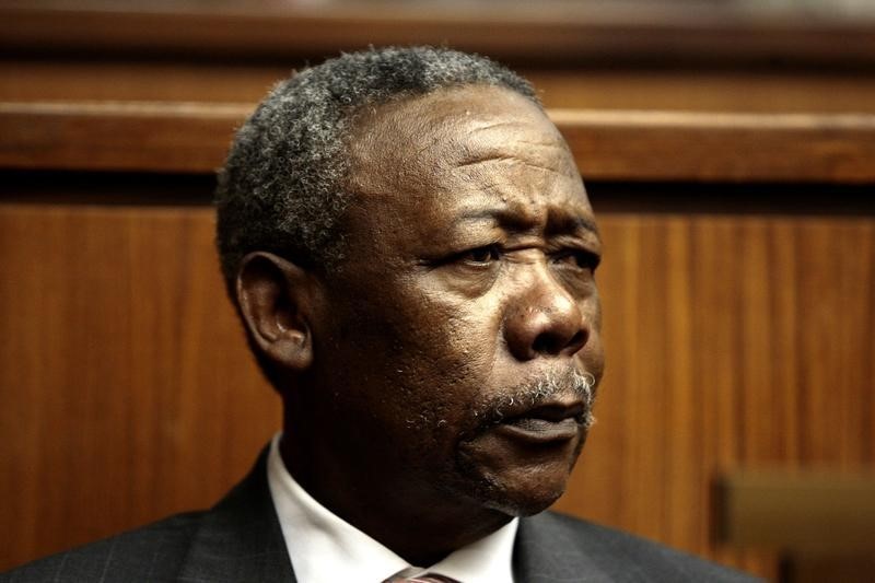 © Reuters. Jackie Selebi , the former head of South Africa's police force, looks on during his sentencing at a South African court in Johannesburg