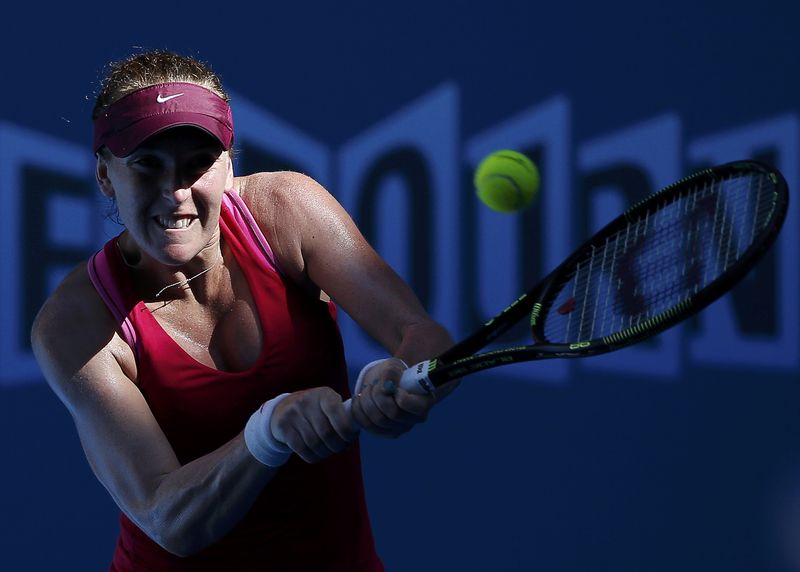 © Reuters. Madison Brengle of the U.S. hits a return against Coco Vandeweghe of the U.S. during their women's singles third round match at the Australian Open 2015 tennis tournament in Melbourne
