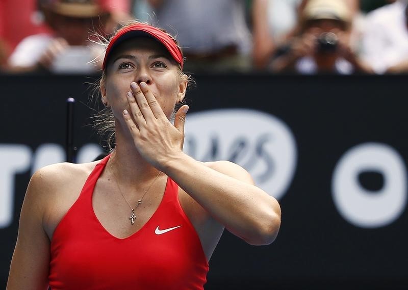 © Reuters. Sharapova of Russia celebrates defeating Peng of China to win their women's singles match at the Australian Open 2015 tennis tournament in Melbourne 