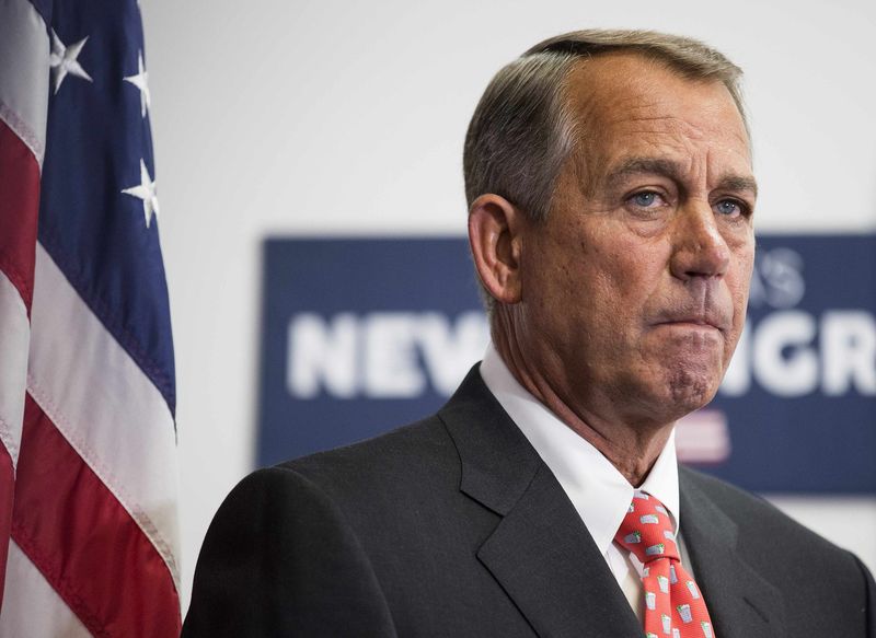 © Reuters. Speaker of the House Boehner listens as his fellow Republicans speak to the media after a conference meeting with House Republicans