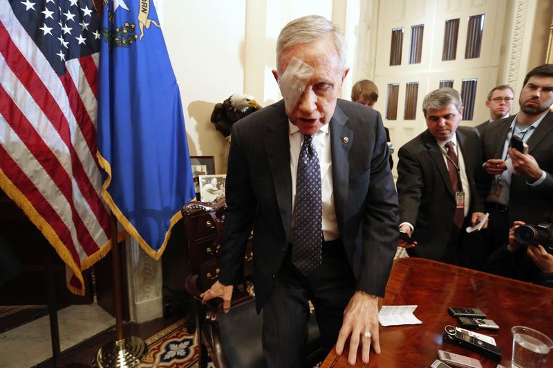 © Reuters. Reid departs at the end of a news conference in his office at the U.S. Capitol in Washington