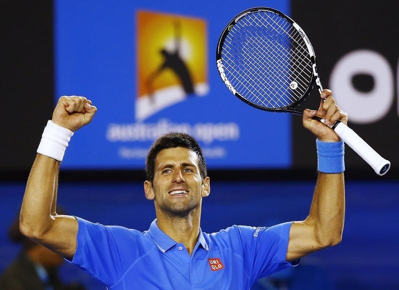 © Reuters. Djokovic of Serbia celebrates defeating Muller of Luxembourg in their men's singles match at the Australian Open 2015 tennis tournament in Melbourne