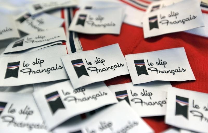 © Reuters. Le Slip Francais underwear company labels are displayed on samples in a workshop of the Moulin Neuf textile company in Saint-Antoine-Cumond