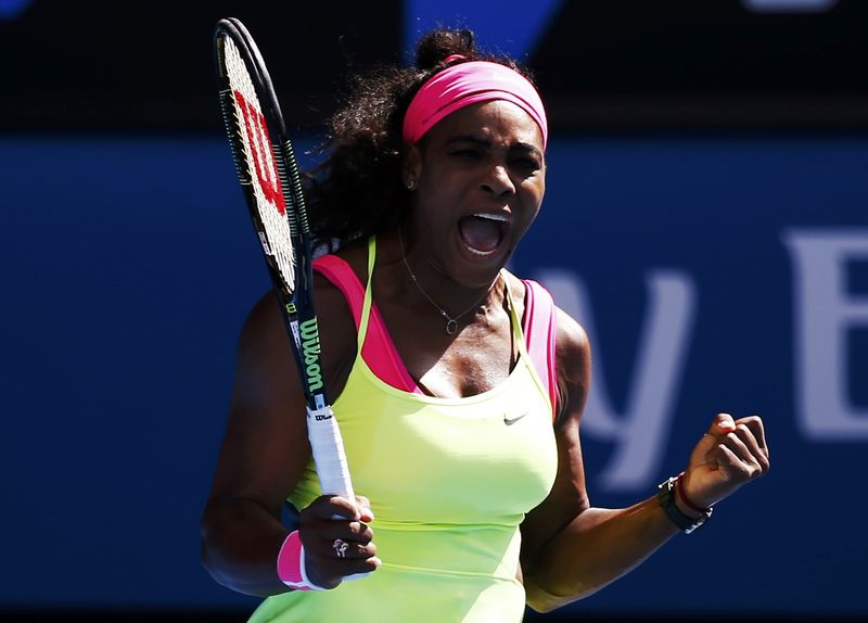 © Reuters. Williams of the U.S. reacts after winning the first set against compatriot Keys during their women's singles semi-final match at the Australian Open 2015 tennis tournament in Melbourne