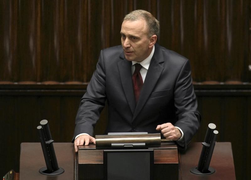 © Reuters. Poland's newly elected Speaker of Parliament Grzegorz Schetyna delivers a speech after being elected by Members of Parliament in Warsaw
