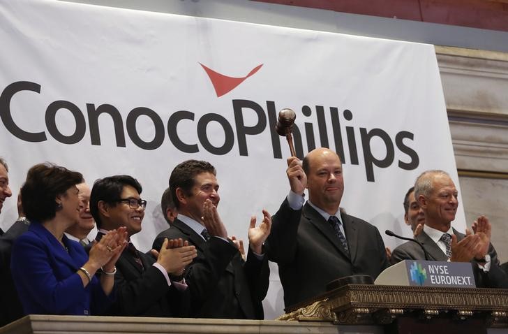 © Reuters. ConocoPhillips Chairman and CEO Lance rings the closing bell at the New York Stock Exchange