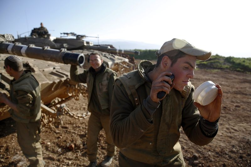 © Reuters. ISRAËL ET LE HEZBOLLAH NE SOUHAITENT PAS L'ESCALADE