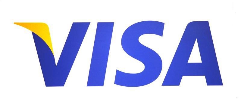 © Reuters. A Visa logo is seen during the International CTIA WIRELESS Conference & Exposition in New Orleans, Louisiana
