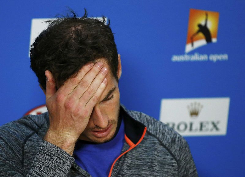 © Reuters. Murray of Britain reacts during a news conference after losing the men's singles final match to Djokovic of Serbia at the Australian Open 2015 tennis tournament in Melbourne 