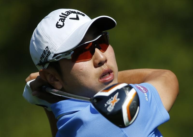 © Reuters. South Korea's Bae Sang-moon hits his tee shot on the seventh hole during the second round of the Masters golf tournament at the Augusta National Golf Club in Augusta