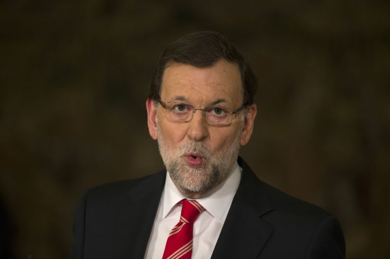 © Reuters. Spain's PM Rajoy speaks after signing an agreement with Sanchez, leader of Spanish Socialist Workers' party, which Rajoy said will introduce new measures intended to beef up Spain's security, in Madrid