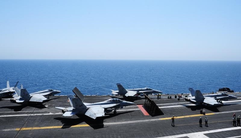 © Reuters. Handout photo shows flight operations aboard the aircraft carrier USS George H.W. Bush in the Gulf