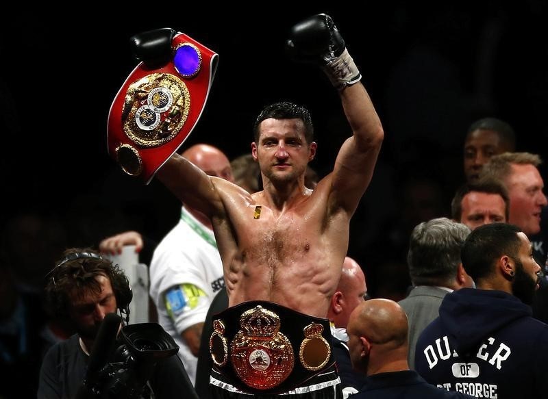 © Reuters. Froch of Britain celebrates winning his WBA and IBF Super Middleweight World Championship title fight in London