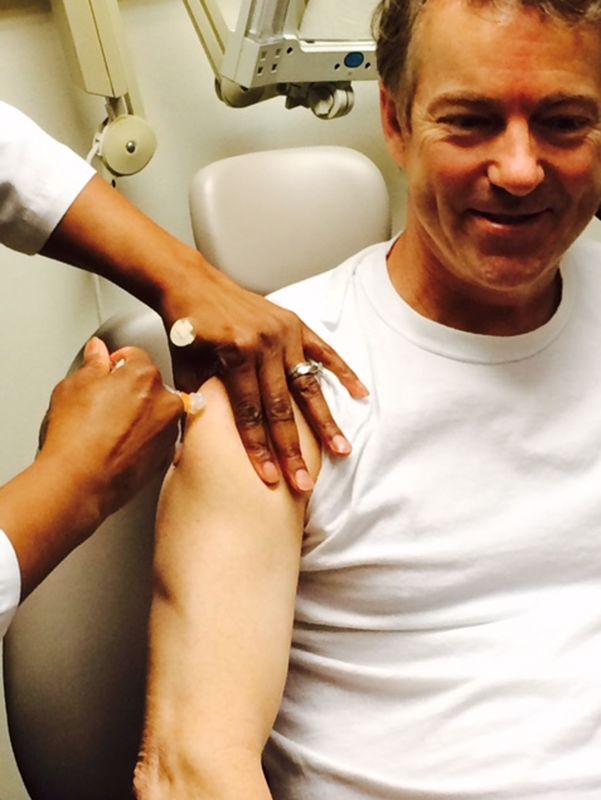 © Reuters. Senator Rand Paul is shown in this photo tweeted by his office being inoculated