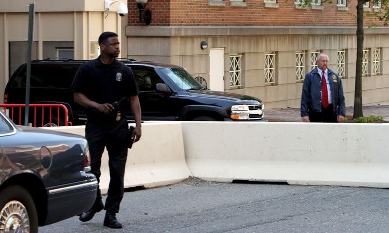 © Reuters. The vehicle carrying Zacarias Moussaoui leaves a US district court in Alexandria