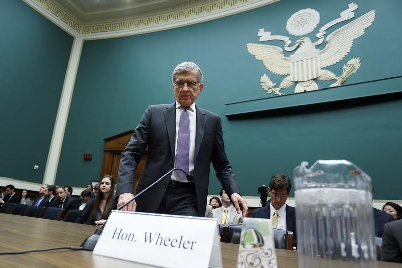 © Reuters. Wheeler takes his seat to testify before a House Energy and Commerce Communications and Technology Subcommittee hearing on oversight of the FCC on Capitol Hill in Washington