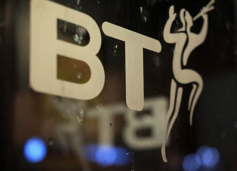 © Reuters. A BT logo is seen on the door of a telephone box in Manchester, northern England