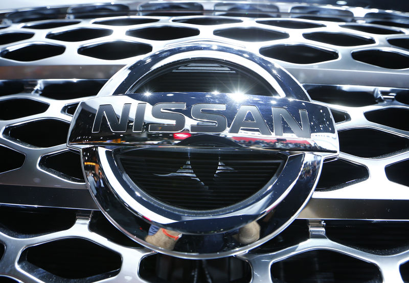 © Reuters. Detail view of the emblem on the 2016 Nissan Titan pickup truck after it was unveiled at the first press preview day of the North American International Auto Show in Detroit