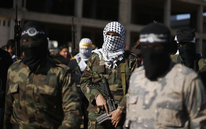 © Reuters. مسلحو غزة يدينون وصف مصر لحماس بأنها جماعة ارهابية