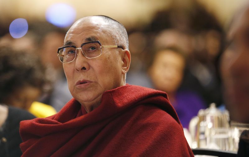 © Reuters. The Dalai Lama attends the National Prayer Breakfast in Washington