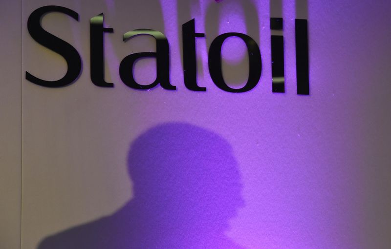 © Reuters. The shadow of Statoil's Chief Executive Saetre is seen as he delivers a speech at a news conference in London
