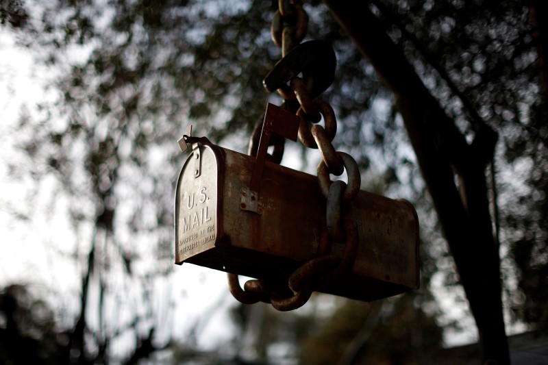 © Reuters. A mailbox for United States Postal Service and other mail is seen outside a home in Malibu