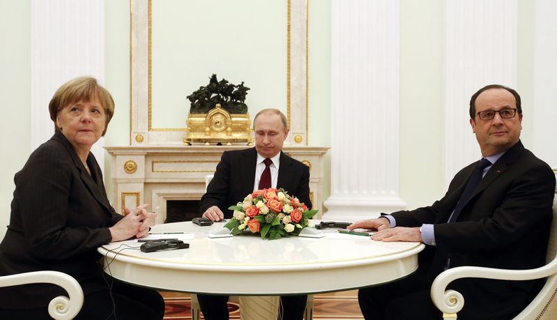 © Reuters. Merkel, Putin e Hollande se reúnem em Moscou